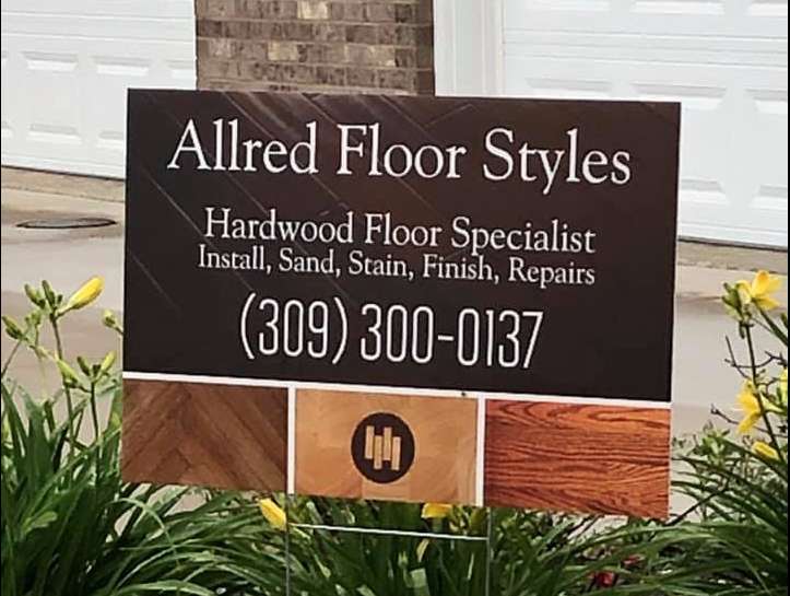 Yard sign for Allred Floor Styles, hardwood floor specialist. Phone number (309) 300-0137.